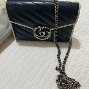 authentic Gucci small bag in dark blue color with white details